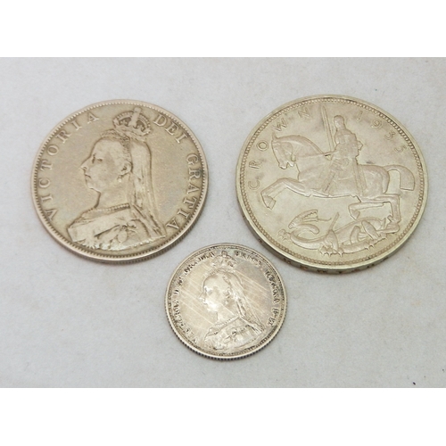 302 - Coins: a Victoria 1887 Double Florin, a George V 1935 Full Crown, George VI Malaya issues, etc.