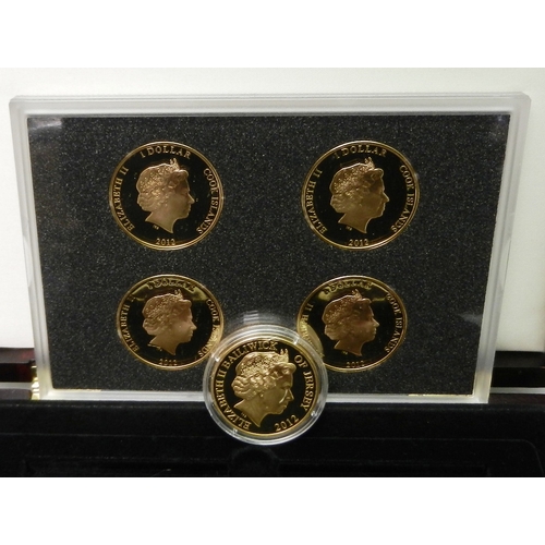 304 - A Westminster Mint RMS Titanic centenary four coin memorial set, Cook Islands, cased; a single simil... 