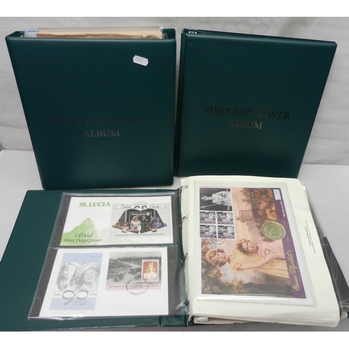 309 - Three albums of stamp and coin covers, all royal interest.