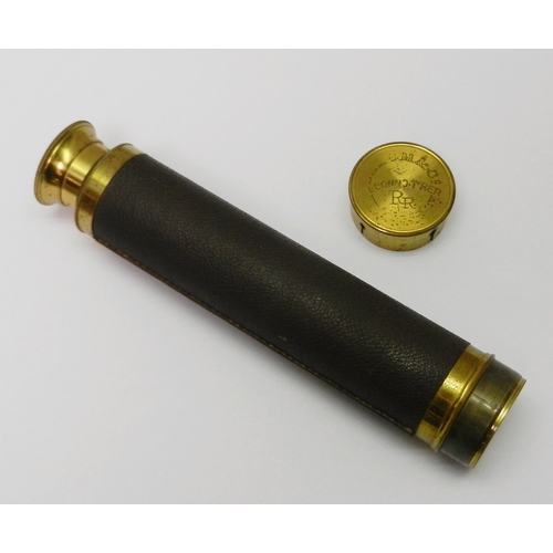 328 - A gilt brass and leather three draw pocket telescope.  150mm closed.