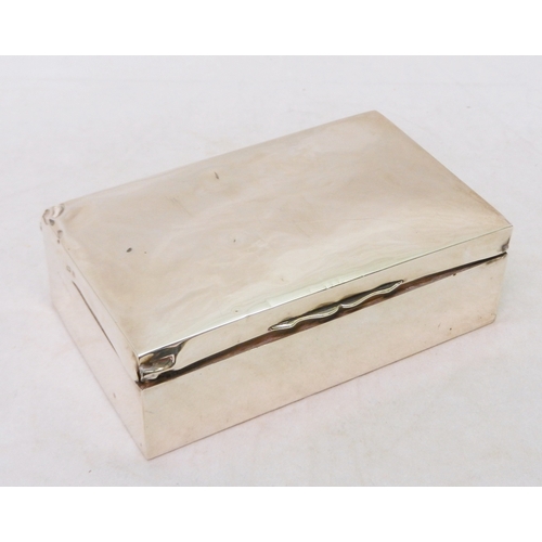 334 - A silver and hardwood cigarette box, a/f dented and missing lid liner.