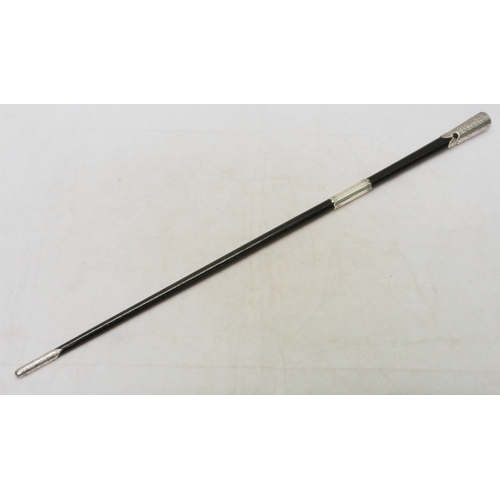 335 - An Edwardian conductor's baton, silver banded ebony.  523mm long