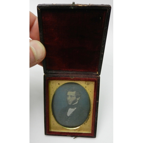 337 - Victorian photography: a cased daguerreotype portrait photograph depicting a merchant marine officer... 