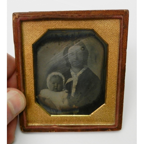 338 - Victorian photography: three daguerreotype portraits / portrait groups each presented in a part case... 