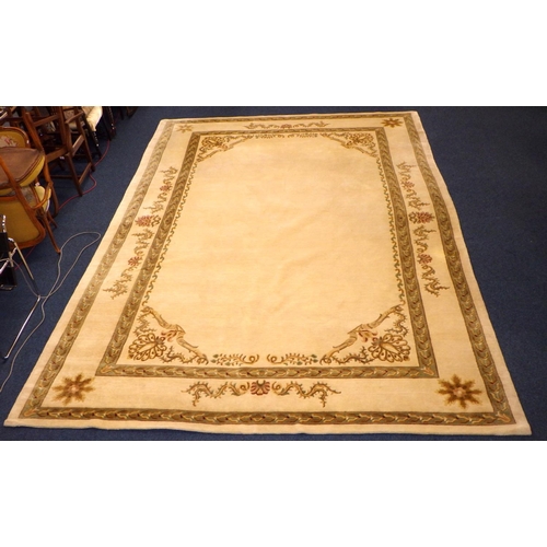826 - A large cream Chinese carpet 430cm x 310cm