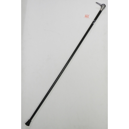 299 - An Edwardian ebony walking cane, the imported silver modelled as a bird's head.  A/F end cut, curren... 