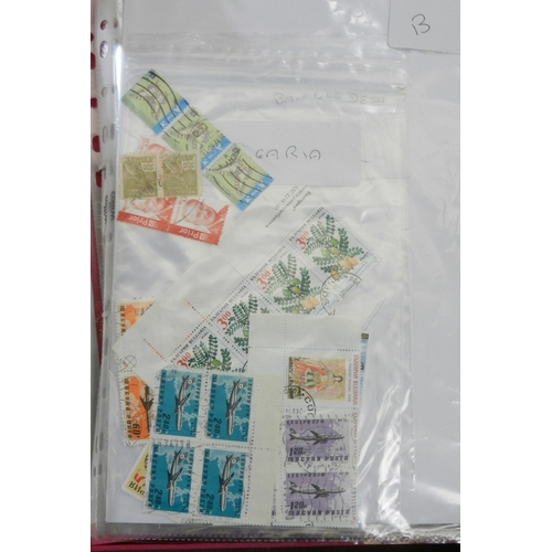 313 - Postage stamps: a collection of ring binder albums, loose stamps, album sheets, covers, postcards,  ... 