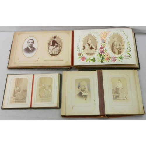 344 - Victorian photographs: two CdV card albums, loose CdV card portrait photographs incl Queen Victoria ... 