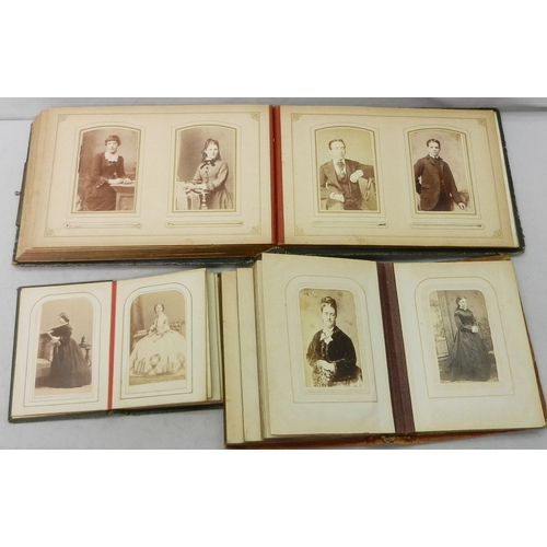 344 - Victorian photographs: two CdV card albums, loose CdV card portrait photographs incl Queen Victoria ... 