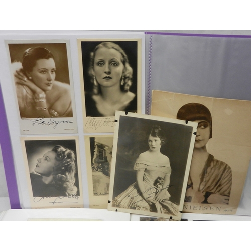 346 - A collection of celebrity interest photographs autographs etc incl signed photographs, studio press ... 