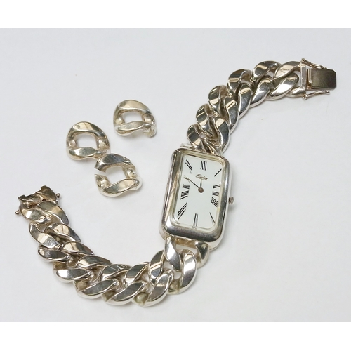 114 - A Quinn bracelet watch comprising a quartz movement beneath an enamel dial in a rectangular tonneau ... 