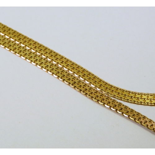 74 - A ribbon necklace, 9ct gold.  520mm long / 10g.