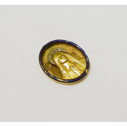43 - A Cartier Paris pendant depicting the Madonna in prayer, unmarked yellow metal with applied white me... 