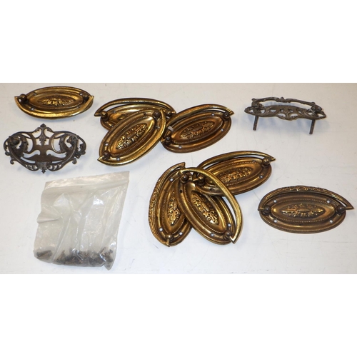 299 - A set of eight brass furniture handles