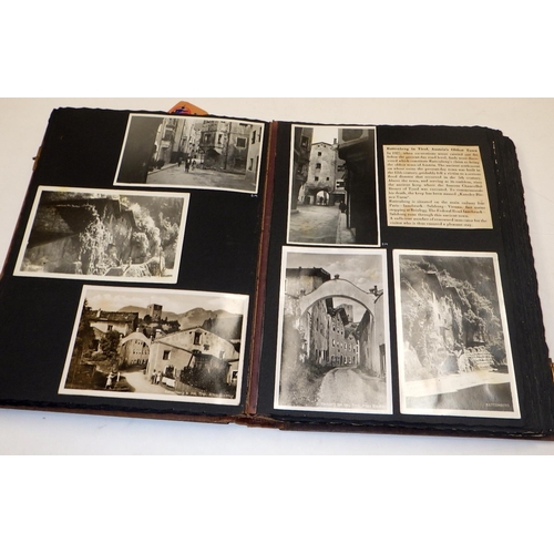 309 - A carved Deer Black Forest postcard album & postcards