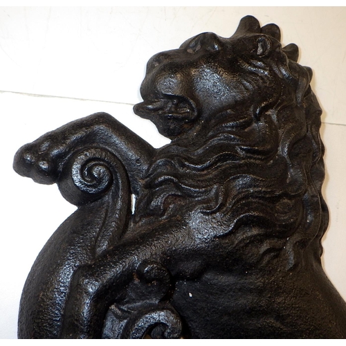 316 - A 19thC cast iron rampant lion door stop 37cm high