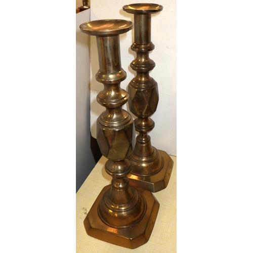 398 - Three pairs of brass candlesticks