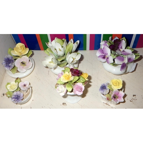 403 - A group of various pill boxes to inc Herrend together with misc ceramic flowers