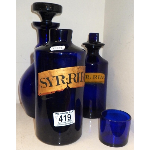 419 - Two Apothecary blue bottles together with a Bristol blue decanter and a small jar (4)