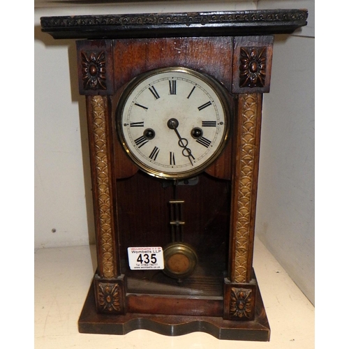 435 - A musical chiming 8 day clock 34cm tall