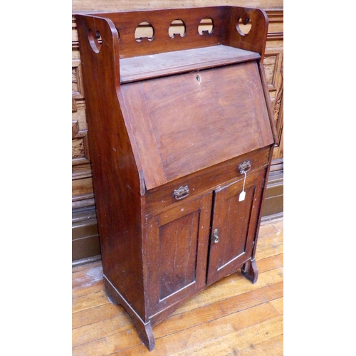 705 - A mahogany Arts & Crafts bureau, a/f cracks, missing escutcheon, 65cm wide, ex Bootham Park Hospital