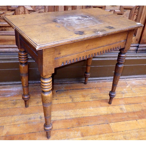 707 - A small Victorian oak side table on turned legs, top marked, 77cm wide, ex Bootham Park Hospital