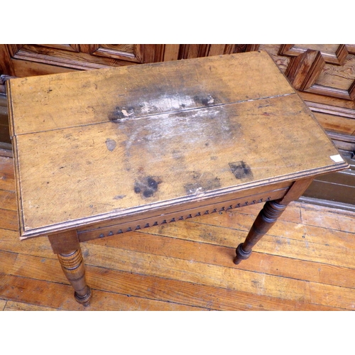 707 - A small Victorian oak side table on turned legs, top marked, 77cm wide, ex Bootham Park Hospital