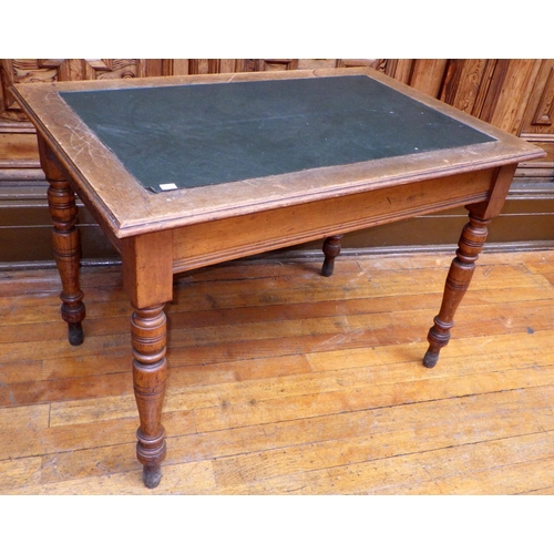 711 - A Victorian library table with inset top on turned legs, 111cm wide, ex Bootham Park Hospital