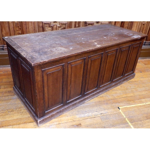 712 - A panelled oak low counter,183cm long,  ex Bootham Park Hospital