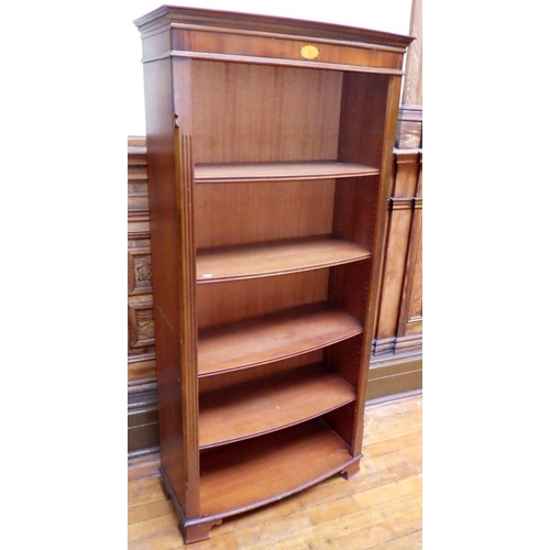 719 - A tall reproduction mahogany bowfronted open bookcase, 92cm wide, ex Bootham Park Hospital