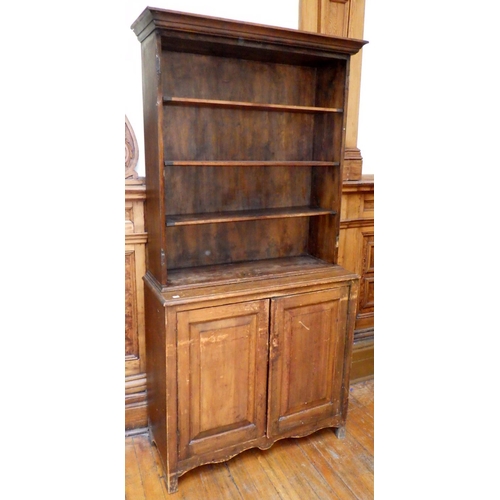 726 - A Victorian pine two section bookcase, missing upper doors, 110cm wide, ex Bootham Park Hospital