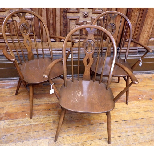 727 - Three Ercol kitchen armchairs, loose, one seat cracked, ex Bootham Park Hospital