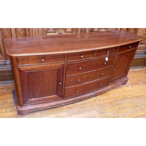 729 - A reproduction mahogany bowfronted sideboard, 200cm long, veneer chipped, ex Bootham Park Hospital