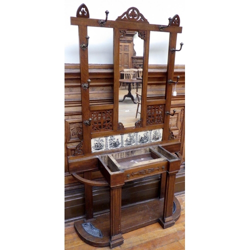 736 - A Victorian oak hallstand with tiled back and marble top, 117cm wide, ex Bootham Park Hospital