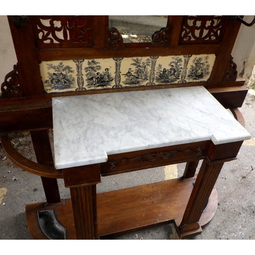 736 - A Victorian oak hallstand with tiled back and marble top, 117cm wide, ex Bootham Park Hospital