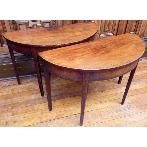 737 - A pair of 19th cen mahogany demi-lune tables, 111cm wide, ex Bootham Park Hospital