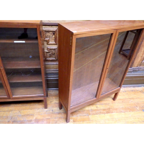 748 - Two teak low bookcases, one missing shelves, both 91cm wide, ex Bootham Park Hospital