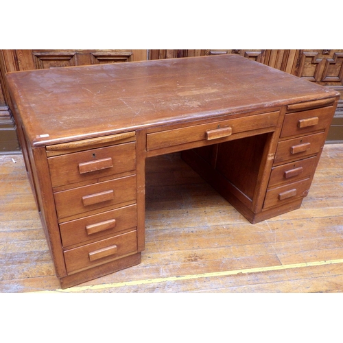 760 - A 1950's oak/ply office desk, 150cm wide, ex Bootham Park Hospital