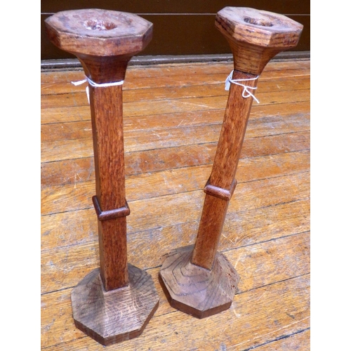 765 - A pair of oak candlesticks on octagonal bases, 41cm tall, ex Bootham Park Hospital