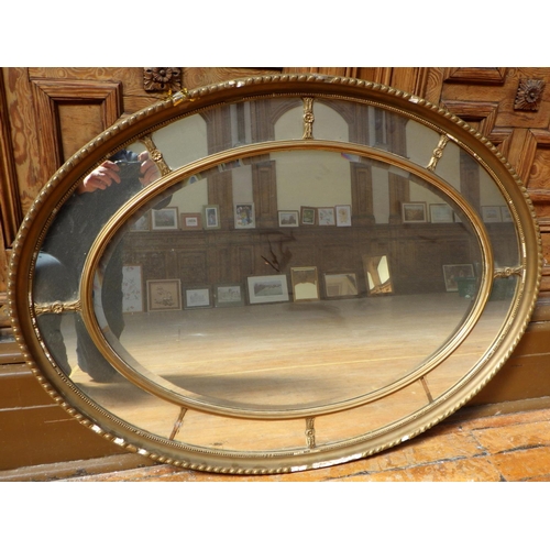 770 - A sectional oval mirror with bevelled central plate, ex Bootham Park Hospital