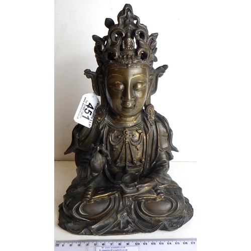 451 - A bronze of Guanyin / Bodhisattva, cast bronze bearing traces of gilt.  Holes and pitting to body be... 