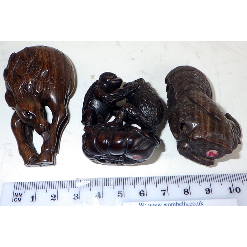 471 - Japanese netsukes: a carved wood cockerel, 5cm tall, signed; two other carved wood examples, signed.... 