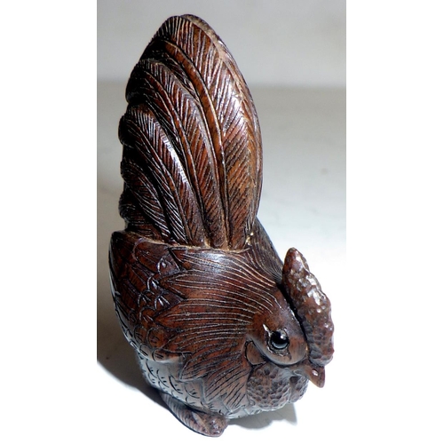 471 - Japanese netsukes: a carved wood cockerel, 5cm tall, signed; two other carved wood examples, signed.... 