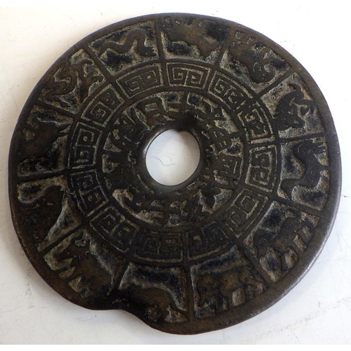 483 - A Chinese bronze talisman / amulet, 6.2cm across together with a 1976 letter from the Victoria and A... 