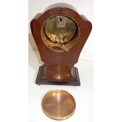 491 - An Edwardian inlaid mantle clock 25cm tall