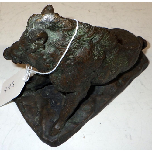 495 - A small bronze figure of a seated boar 10cm tall