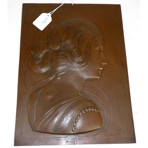 496 - An Art Nouveau copper panel of a young lady 23 x 32cm