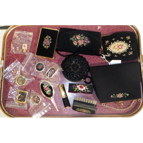 498 - A group of embroidered purses, pill boxes, etc
