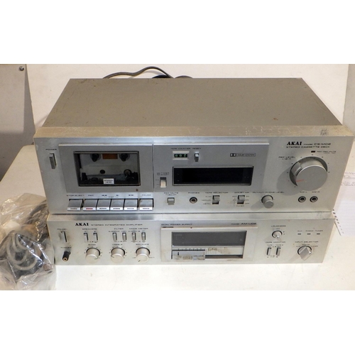 601 - An Akai amp & tape deck 
all electricals sold as seen