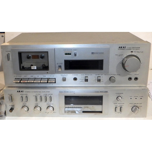 601 - An Akai amp & tape deck 
all electricals sold as seen